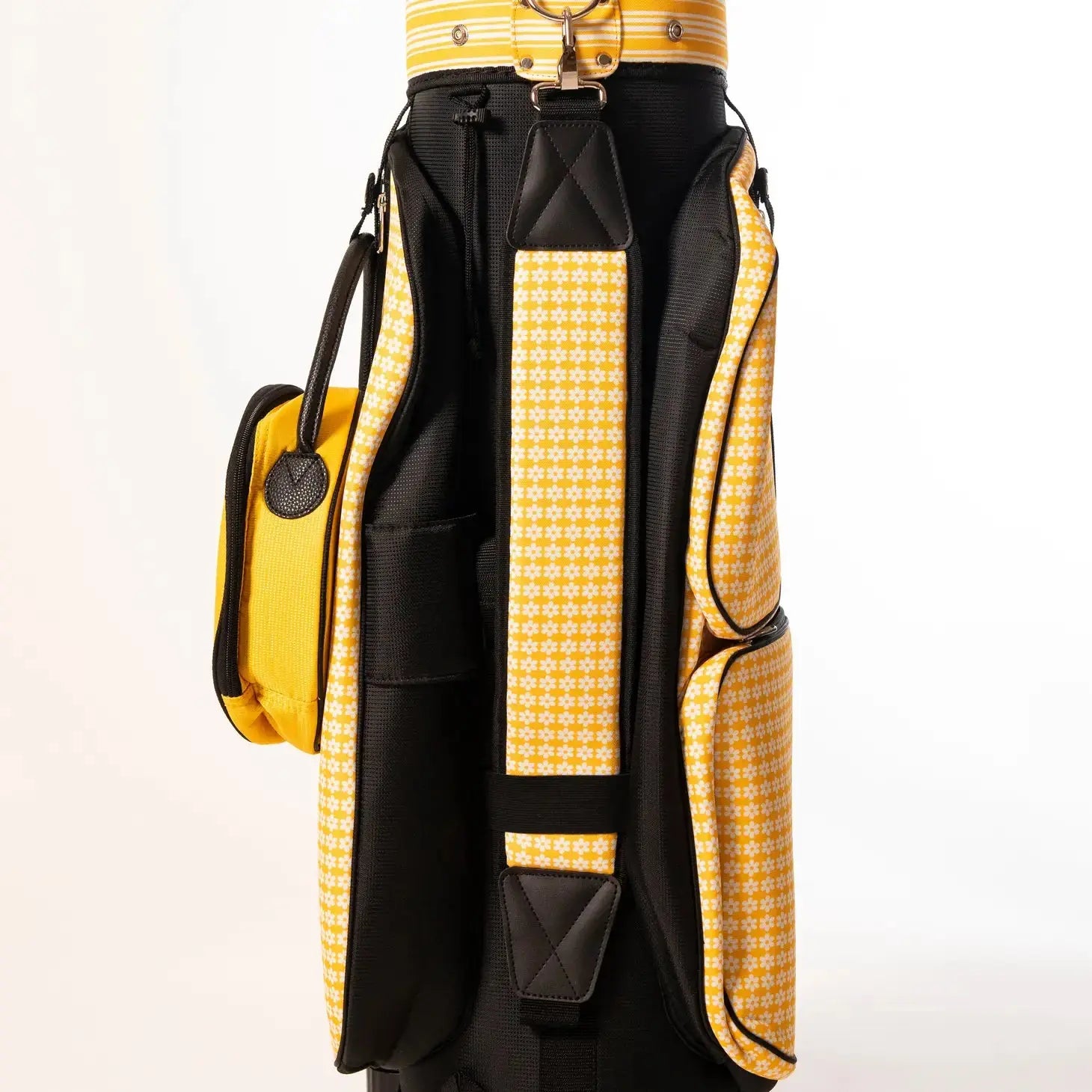 Daisy Golf Cart Bag- Runway Athletics. Playful daisy print, along with our black honeycomb fabric. The shoulder strap is located at back of bag