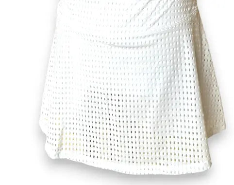 Elevate your tennis game with our White Tennis Outfit. Classic, stylish, and perfect for a winning look. Shop now 