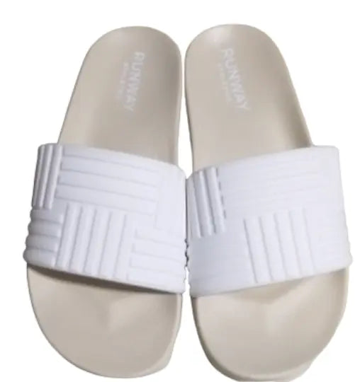 Indulge in comfort and relaxation with our White Rubber Spa Slides. Slip into luxury for ultimate spa experiences with these slides. 