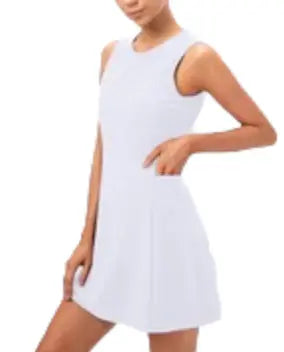 White Tennis Outfit online from Runway Athletics. It has a built-in shelf bra and separated shorts with pockets. 80% Nylon/20% Spandex