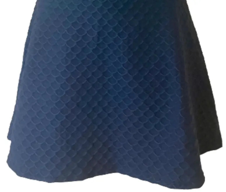 Buy this Nola Navy Blue Scallop Skirt- Runway Athletics. Made with high-quality materials and designed for both comfort and style.