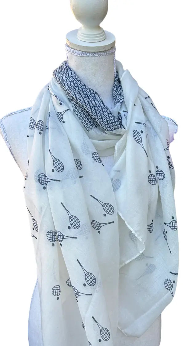 Protect yourself from the sun in style with our versatile Racquet Sun Scarf/Wrap. Stay cool and fashionable on and off the court. Shop now