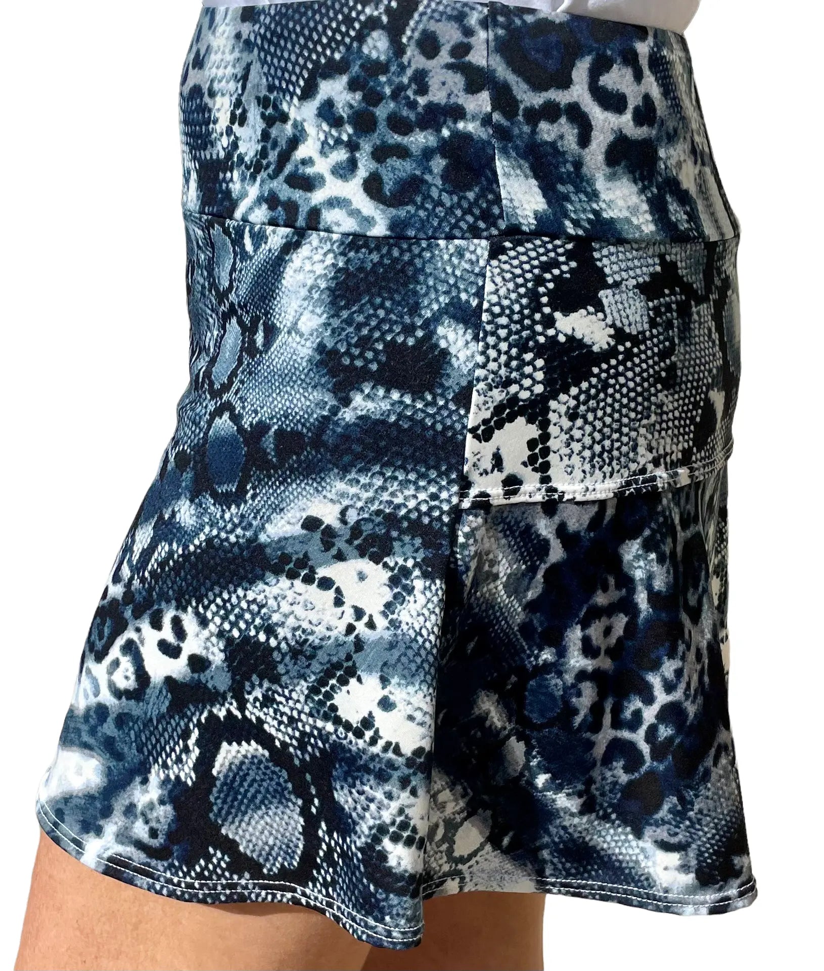 Sport skorts in animal print from Runway Athletics. Ultra-high compression classic black under-short with comfort gusset.