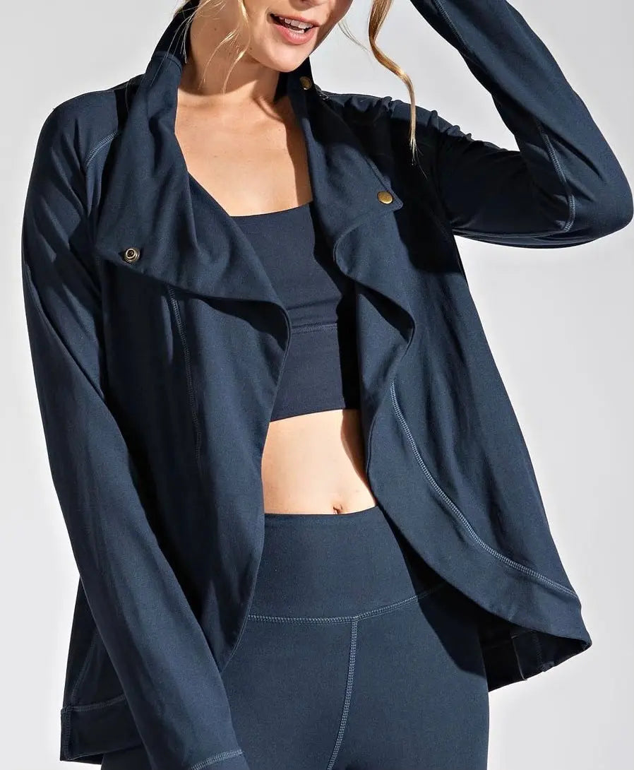 Shop womens tennis jacket from Runway Athletics. You will look great and feel warm and cozy on cool, fall mornings in this Shrug.